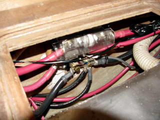 Fuses and wiring leading into battery compartment